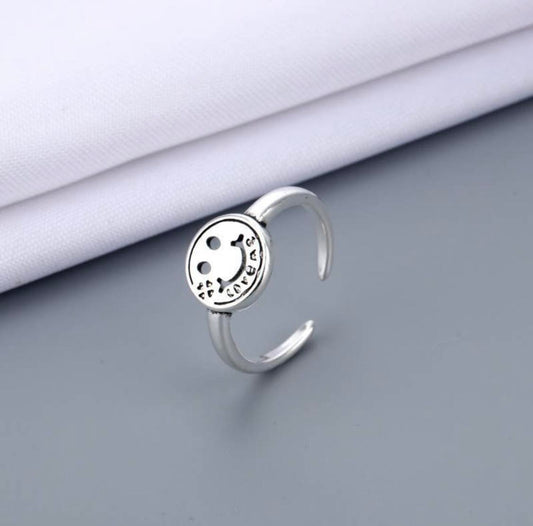 Round happy face ring